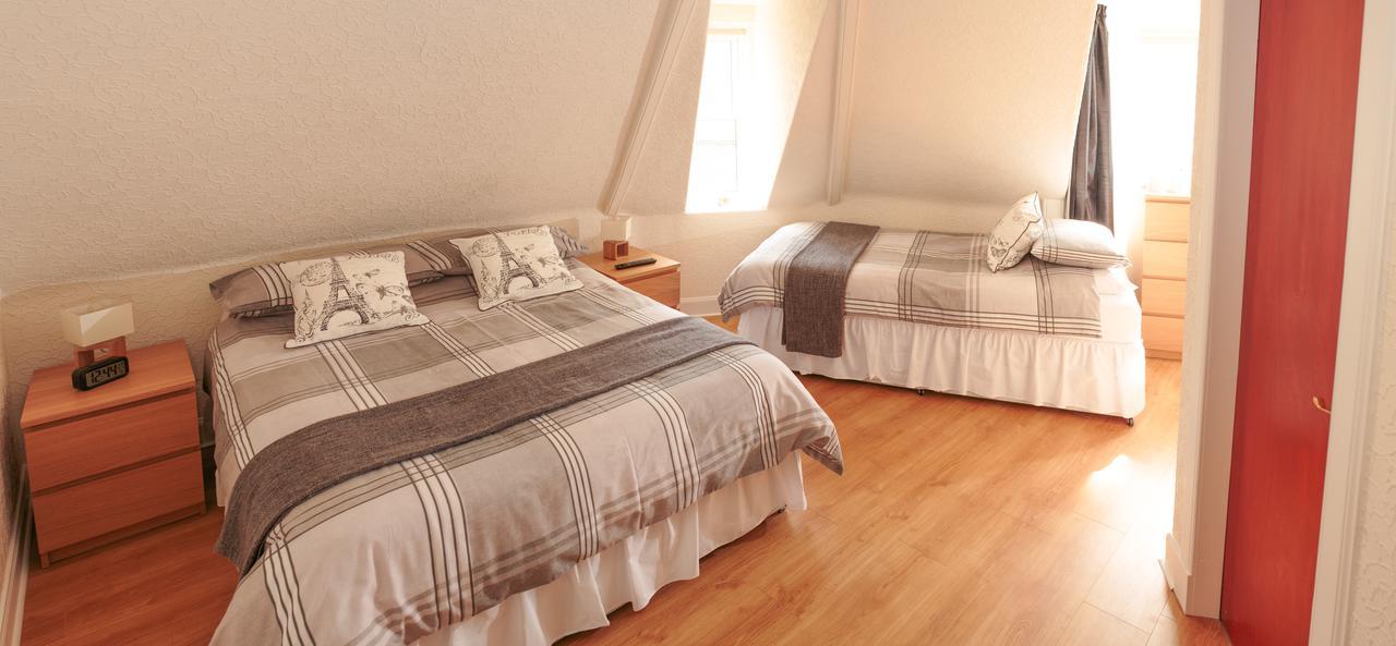 Corner House Hotel Инерлитън Екстериор снимка