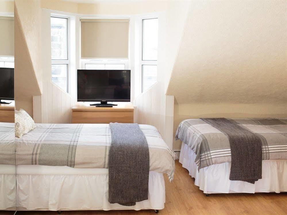 Corner House Hotel Инерлитън Екстериор снимка